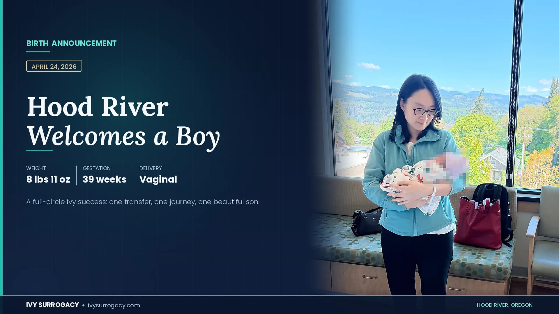 Ivy Surrogacy birth announcement featured image — gestational carrier holding a newborn baby boy in a swaddle and pink-and-blue striped hospital hat by a sunlit window with mountain views in Hood River, Oregon. Born April 24, 2026, weighing 8 lbs 11 oz at 39 weeks via vaginal delivery. The baby's face is pixelated for privacy.